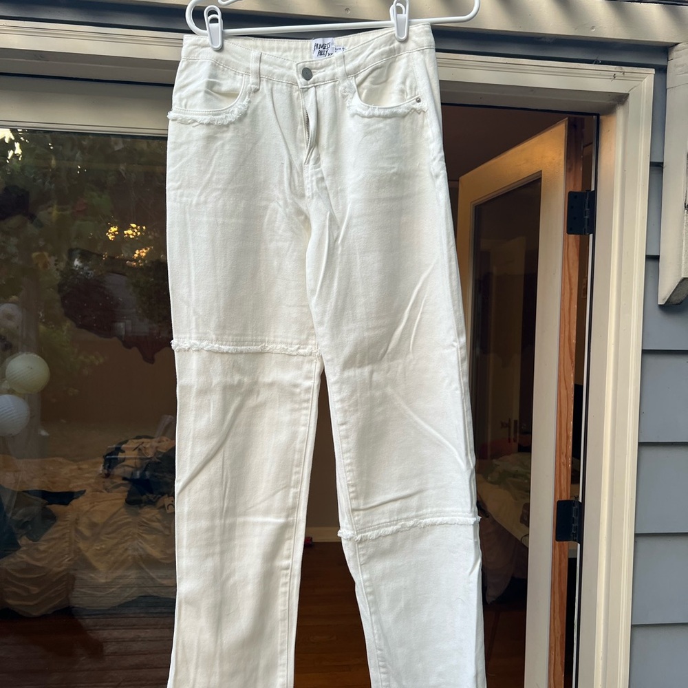 Pale Blue Distressed Jeans